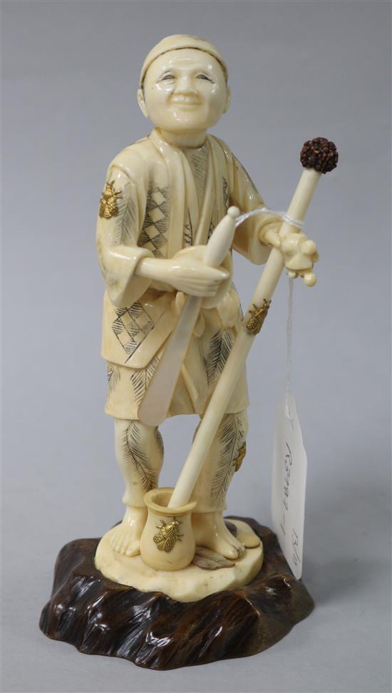 A Japanese ivory figure of a man